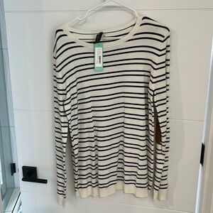 Cute off white long sleeve shirt with brown patches on elbows